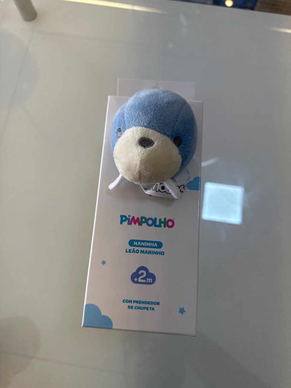 NANINHA COM PRENDEDOR DE CHUPETA MASC PIMPOLHO AZUL/LEAO MARINHO